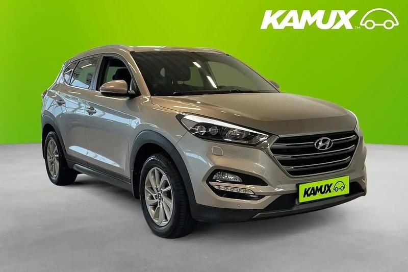 Brun Begagnad 2016 Hyundai Tucson SUV | 214 800 kr (Marknadspris) - Bild 1/4
