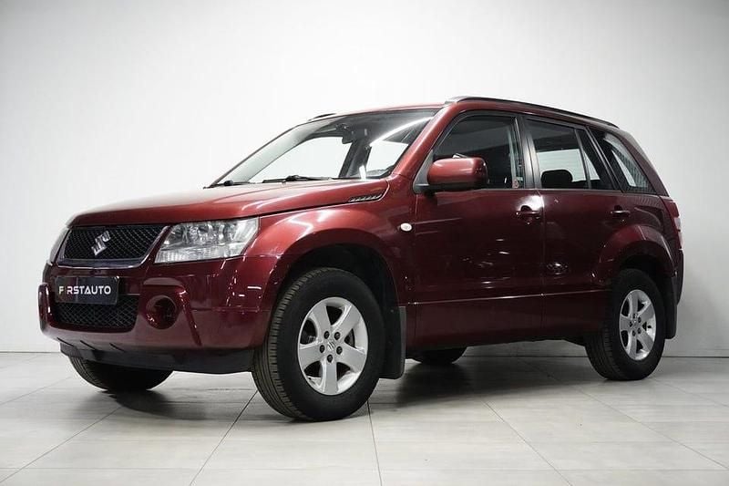 Röd Begagnad 2006 Suzuki Grand Vitara SUV | 64 900 kr (Marknadspris) - Bild 1/4