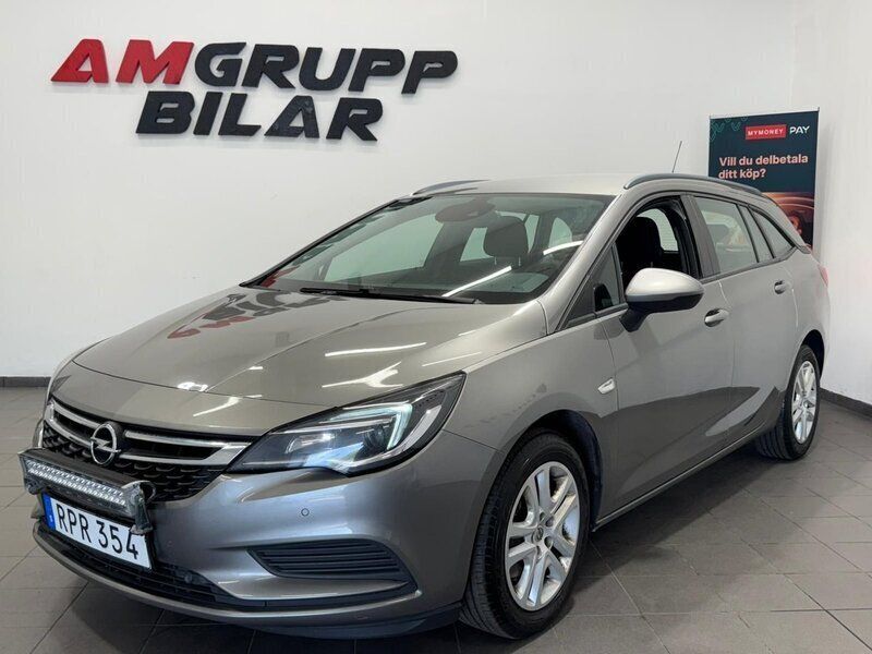 Grå Begagnad 2016 Opel Astra Enjoy Kombi | 54 900 kr (Dyr) - Bild 1/4