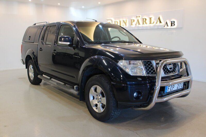 Mörkblå (blå) Begagnad 2008 Nissan Navara Pickup | 89 900 kr (Lite dyr) - Bild 1/4
