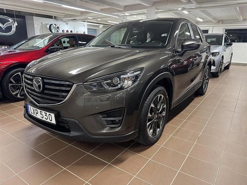 Brun Begagnad 2015 Mazda CX-5 Optimum SUV | 150 000 kr (Marknadspris) - Bild 1/4