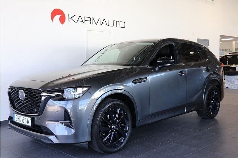 Grå Begagnad 2023 Mazda CX-60 Homura-Line SUV | 484 900 kr (Marknadspris) - Bild 1/4