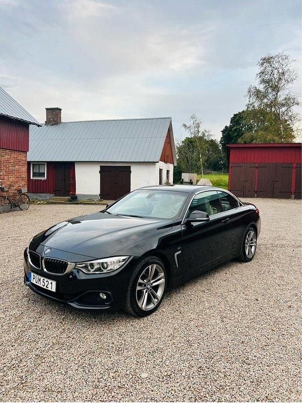 Svart Begagnad 2014 BMW 428 Sport Line Cab | 199 000 kr (Superpris) - Bild 1/4