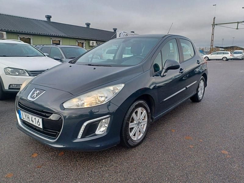 Mörkgrå Begagnad 2011 Peugeot 308 Halvkombi | 49 900 kr (Marknadspris) - Bild 1/4