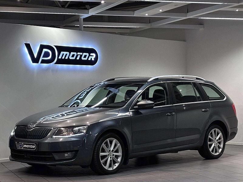 Grå Begagnad 2014 Skoda Octavia Kombi | 94 700 kr (Superpris) - Bild 1/4