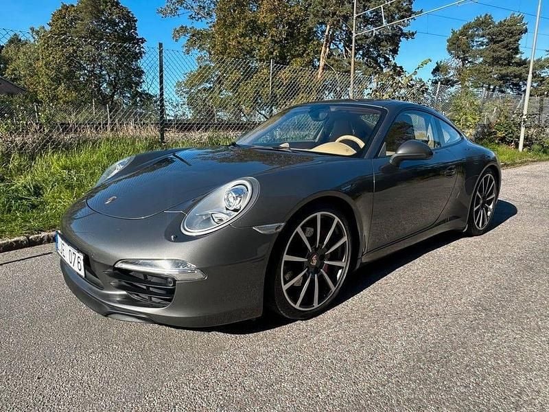 Mörkgrå Begagnad 2012 Porsche 911 Carrera S Sport Sportkupé | 729 000 kr - Bild 1/4