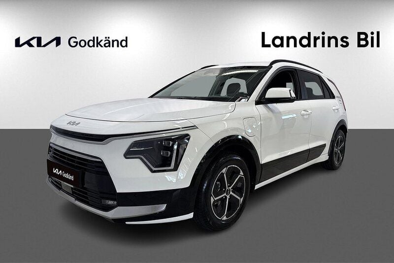 Vit Begagnad 2024 Kia Niro Advance SUV | 389 300 kr (Marknadspris) - Bild 1/4