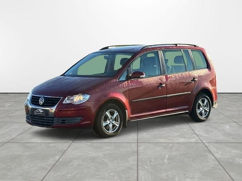 Mörkröd Begagnad 2009 VW Touran Conceptline Minibuss | 29 900 kr (Marknadspris) - Bild 1/4