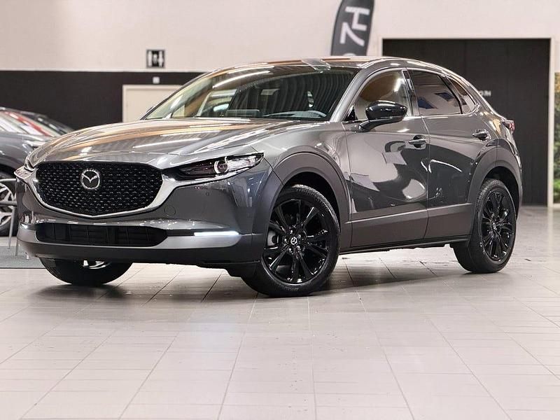 Grå (machine grey) Begagnad 2025 Mazda CX-30 Homura-Line SUV | 362 100 kr (Lite dyr) - Bild 1/4