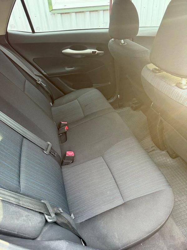 Begagnad Toyota Auris 124 HK (91 kW) 2008 Röd Halvkombi