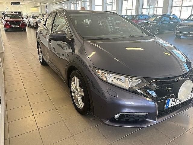 Begagnad Honda Civic Elegance 120 HK (88 kW) 2014 Blå Kombi