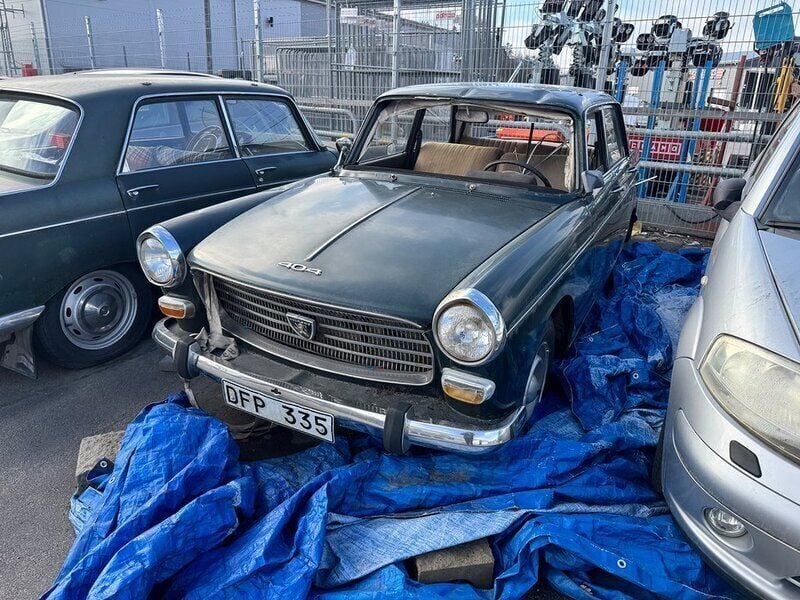 Mörkgrön Begagnad 1970 Peugeot 404 GTi Sedan | 35 002 kr - Bild 1/4