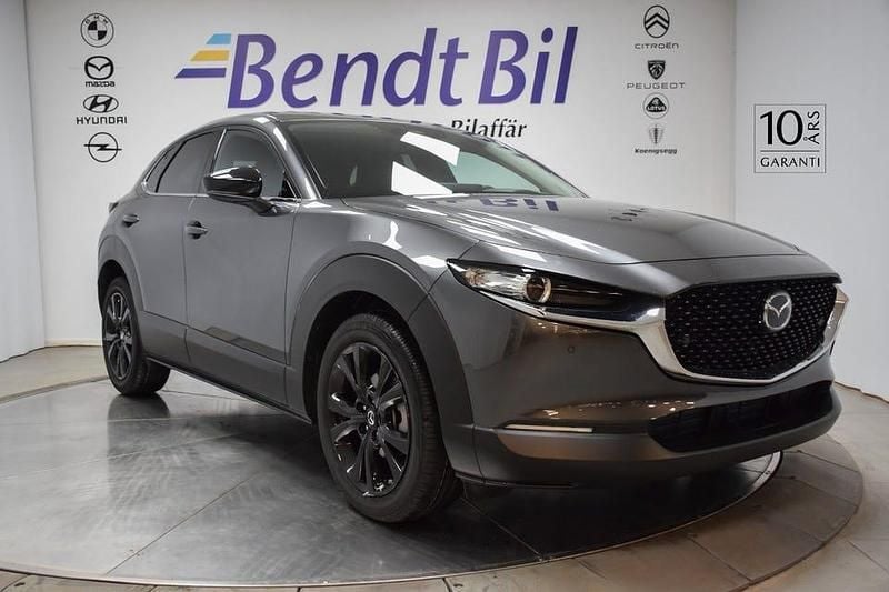 Grå Ny 2025 Mazda CX-30 Homura-Line SUV | 349 500 kr - Bild 1/3