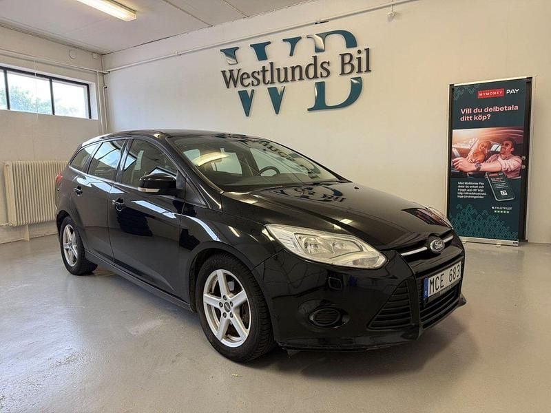 Svart Begagnad 2013 Ford Focus Trend Kombi | 49 900 kr (Marknadspris) - Bild 1/4