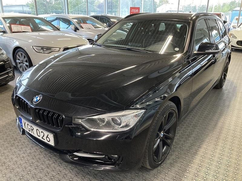 Svart Begagnad 2014 BMW 320 Sport Line Kombi | 129 000 kr (Bra pris) - Bild 1/4