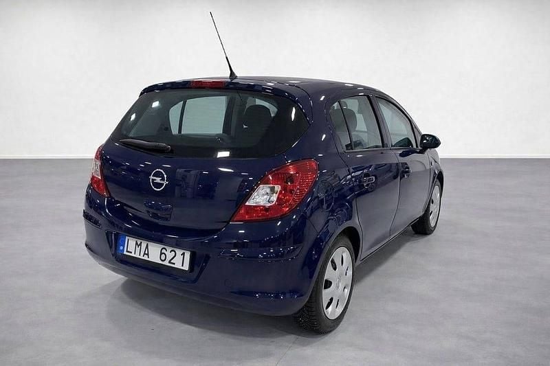 Begagnad Opel Corsa 90 HK (66 kW) 2009 Blå Halvkombi