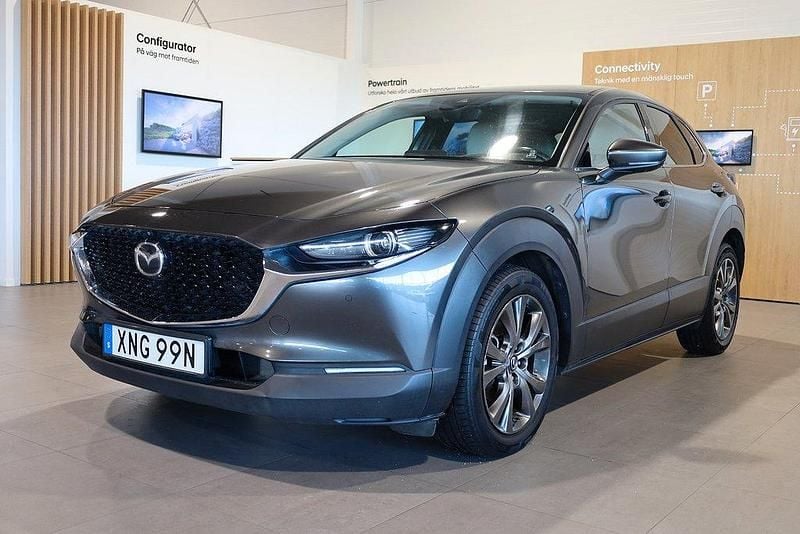 Grå (machine gray metallic) Begagnad 2019 Mazda CX-30 Cosmo SUV | 239 800 kr (Marknadspris) - Bild 1/3