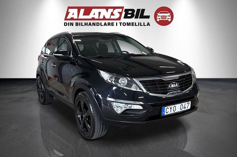 Svart Begagnad 2013 Kia Sportage Comfort SUV | 79 000 kr (Marknadspris) - Bild 1/4