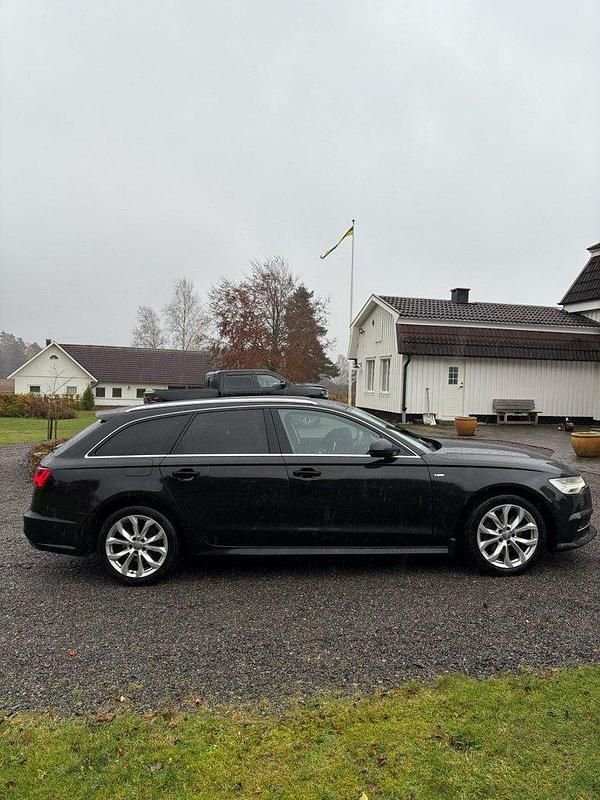 Svart Begagnad 2017 Audi A6 Ambition Kombi | 168 000 kr (Marknadspris) - Bild 1/4