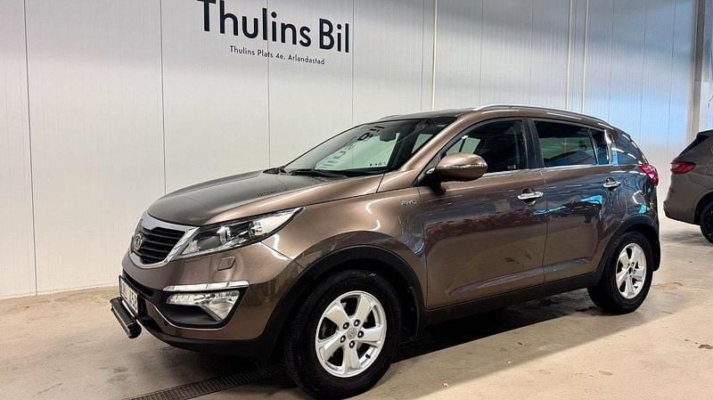 Ljusbrun Begagnad 2011 Kia Sportage SUV | 99 900 kr (Marknadspris) - Bild 1/4