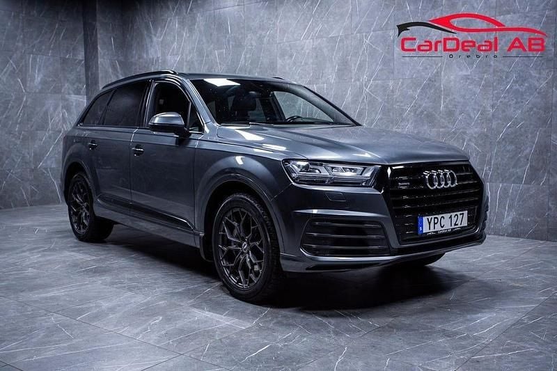 Grå Begagnad 2016 Audi Q7 S-Line SUV | 289 800 kr (Bra pris) - Bild 1/4