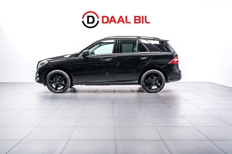 Svart Begagnad 2013 Mercedes ML350 AMG line SUV | 229 700 kr (Marknadspris) - Bild 1/4