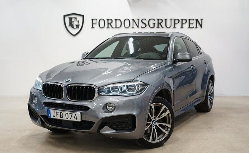 Grå Begagnad 2016 BMW X6 M Sport SUV | 334 800 kr (Marknadspris) - Bild 1/4