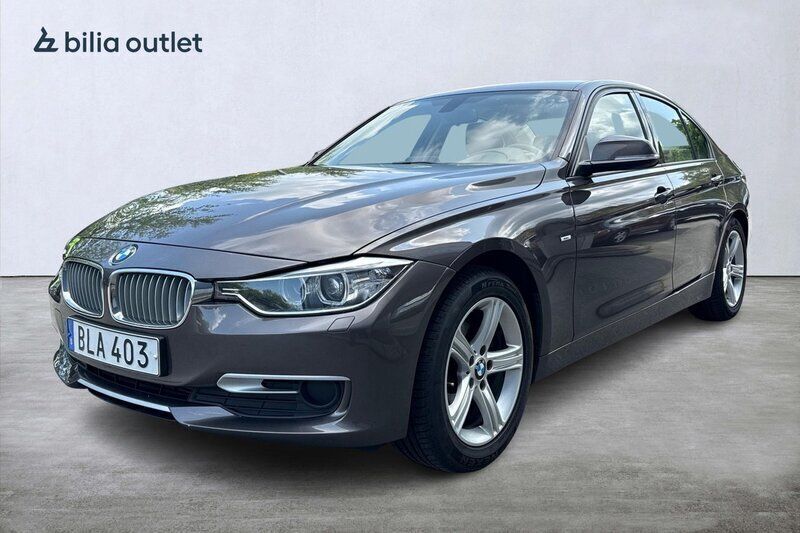 Brun Begagnad 2012 BMW 320 Sedan | 139 900 kr (Marknadspris) - Bild 1/4