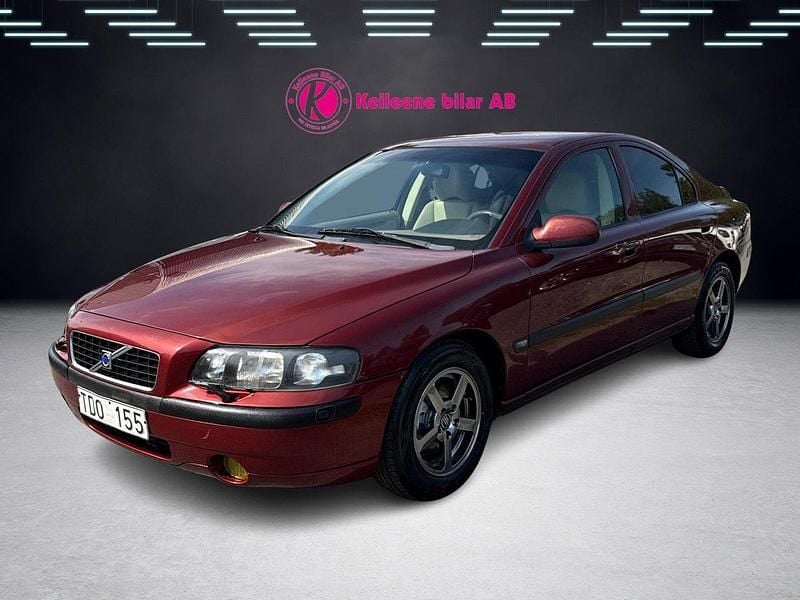 Mörkröd Begagnad 2002 Volvo S60 Business Edition Sedan | 33 900 kr (Marknadspris) - Bild 1/4