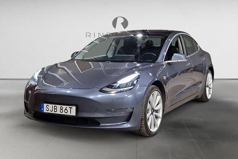 Grå Begagnad 2020 Tesla Model 3 Long Range AWD Sedan | 209 900 kr (Marknadspris) - Bild 1/3