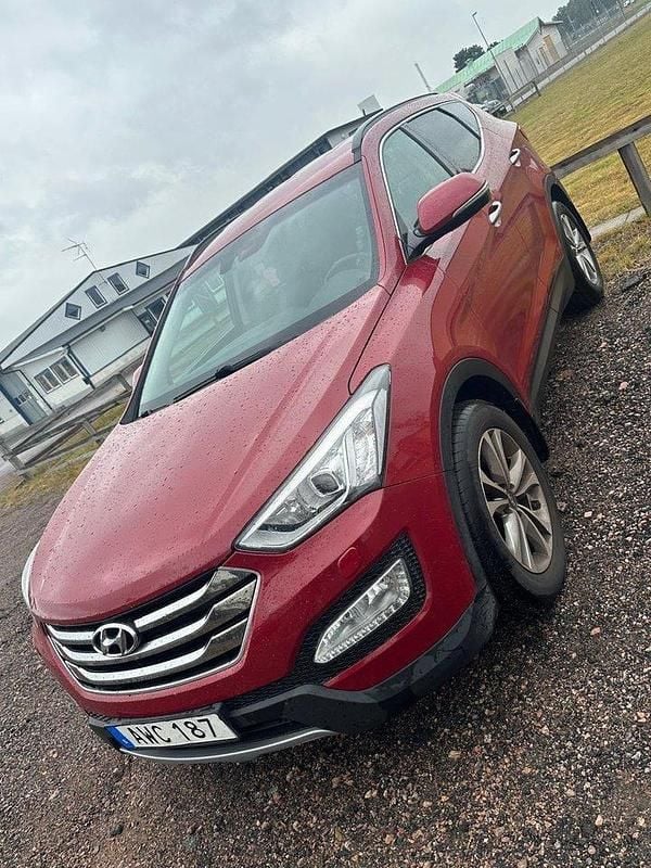 Röd Begagnad 2015 Hyundai Santa Fe Premium SUV | 125 000 kr (Bra pris) - Bild 1/4