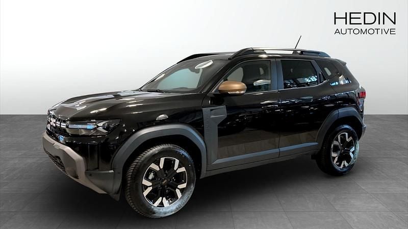 Grå Ny 2025 Dacia Duster Extreme SUV | 335 900 kr (Marknadspris) - Bild 1/4