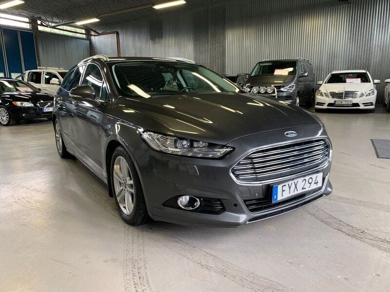Grå Begagnad 2015 Ford Mondeo Titanium Kombi | 119 900 kr (Marknadspris) - Bild 1/4