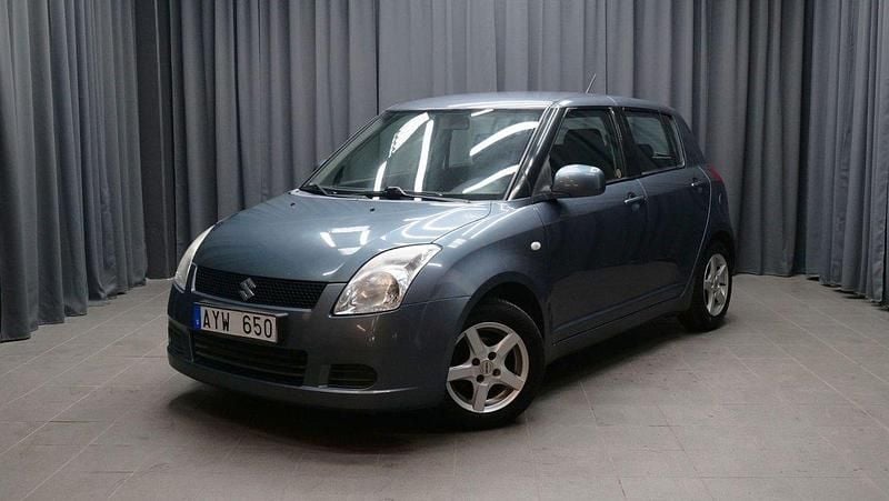 Mörkgrå Begagnad 2006 Suzuki Swift Halvkombi | 34 900 kr (Marknadspris) - Bild 1/4