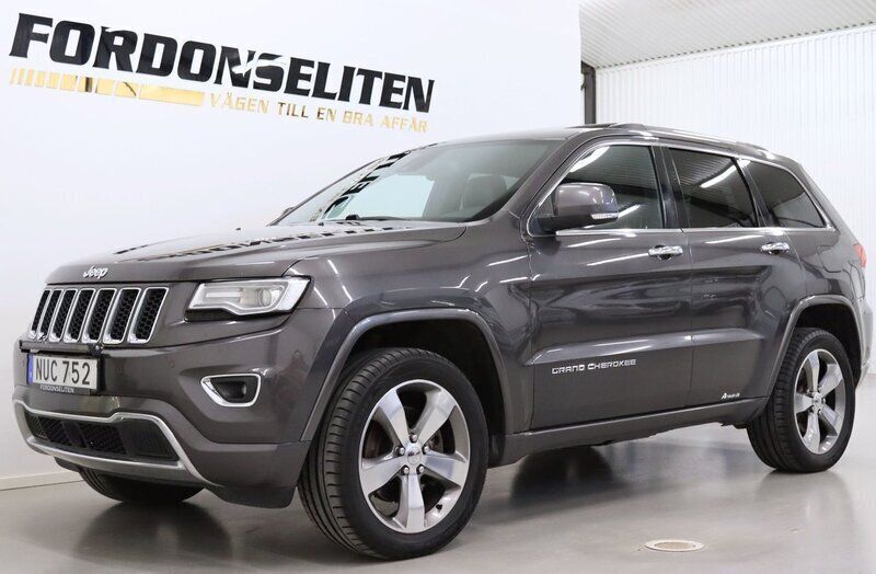 Grå Begagnad 2015 Jeep Grand Cherokee SUV | 149 900 kr (Marknadspris) - Bild 1/4