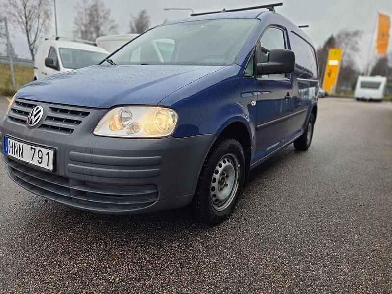 Mörkblå (blå) Begagnad 2009 VW Caddy Maxi Minibuss | 45 000 kr (Marknadspris) - Bild 1/4