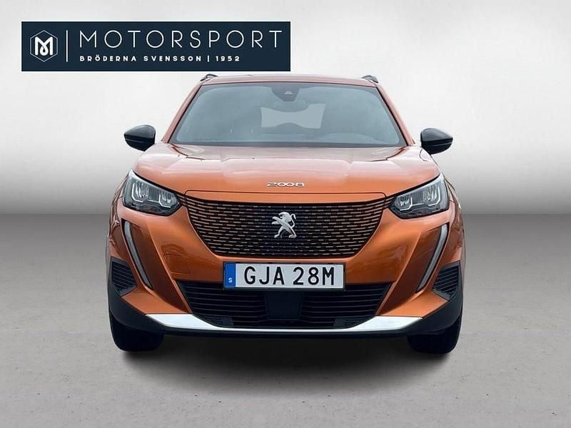 Begagnad Peugeot e-2008 100 kW (136 HK) 2023 Orange metallic SUV