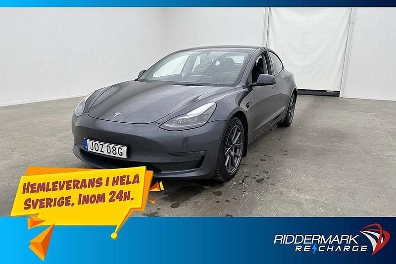 Grå Begagnad 2021 Tesla Model 3 Long Range AWD Sedan | 319 800 kr (Marknadspris) - Bild 1/3