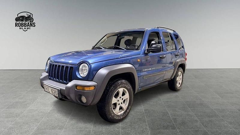 Blå Begagnad 2003 Jeep Cherokee SUV | 29 799 kr - Bild 1/4