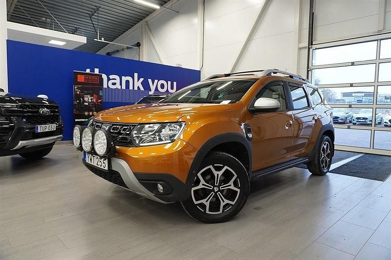 Orange Begagnad 2018 Dacia Duster Prestige SUV | 164 500 kr (Marknadspris) - Bild 1/4
