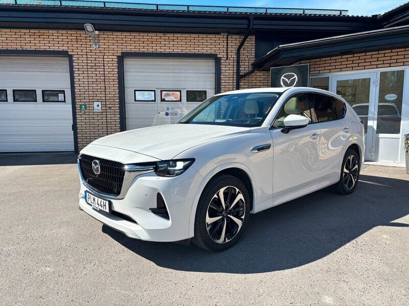 Rhodium white Begagnad 2022 Mazda CX-60 Takumi-Line SUV | 469 500 kr (Marknadspris) - Bild 1/4