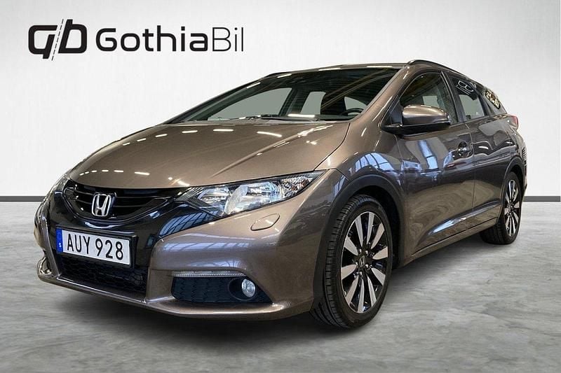 Ljusbrun Begagnad 2014 Honda Civic Sport Kombi | 109 900 kr (Marknadspris) - Bild 1/4