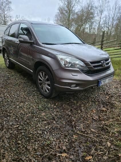 Grå Begagnad 2010 Honda CR-V Executive SUV | 85 000 kr (Marknadspris) - Bild 1/4