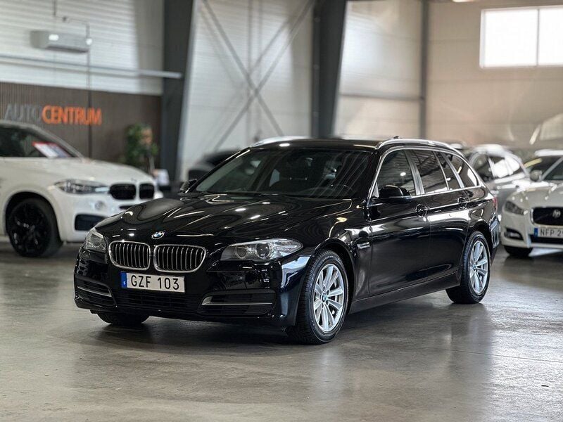 Svart Begagnad 2013 BMW 520 Kombi | 129 900 kr (Marknadspris) - Bild 1/4