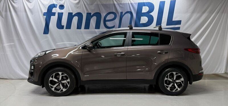Brun Begagnad 2018 Kia Sportage Advance SUV | 209 500 kr (Marknadspris) - Bild 1/4
