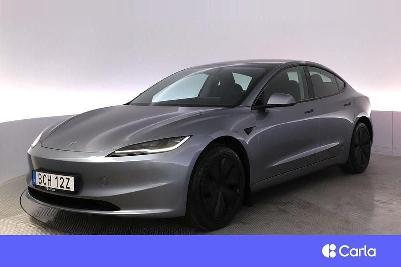 Grå Begagnad 2024 Tesla Model 3 Long Range Sedan | 489 900 kr - Bild 1/4