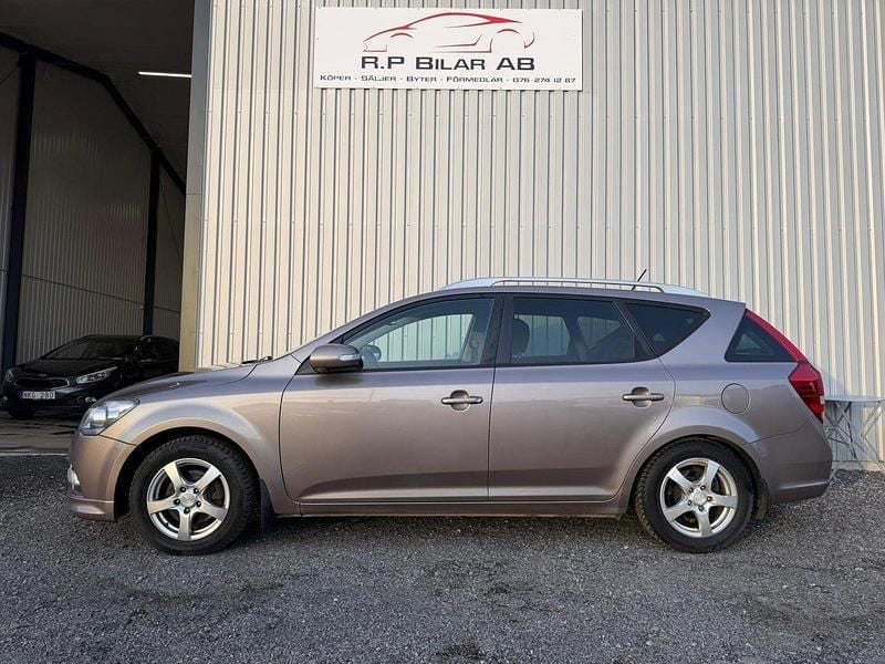 Mörkgrå Begagnad 2012 Kia Ceed Sportswagon Kombi | 52 900 kr (Bra pris) - Bild 1/4