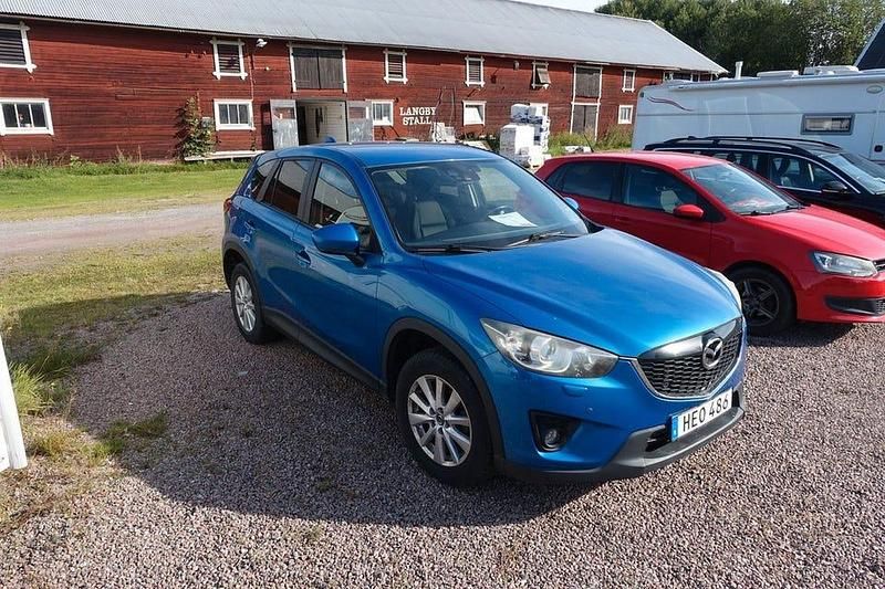 Blå Begagnad 2012 Mazda CX-5 SUV | 79 900 kr (Marknadspris) - Bild 1/4