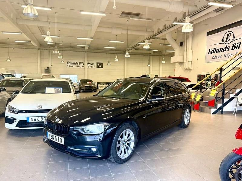 Svart Begagnad 2017 BMW 320 Sport Line Kombi | 178 000 kr (Marknadspris) - Bild 1/4