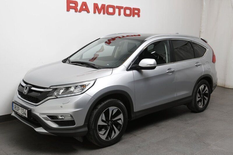 Silver (silver metallic ) Begagnad 2015 Honda CR-V Executive SUV | 179 800 kr (Marknadspris) - Bild 1/3